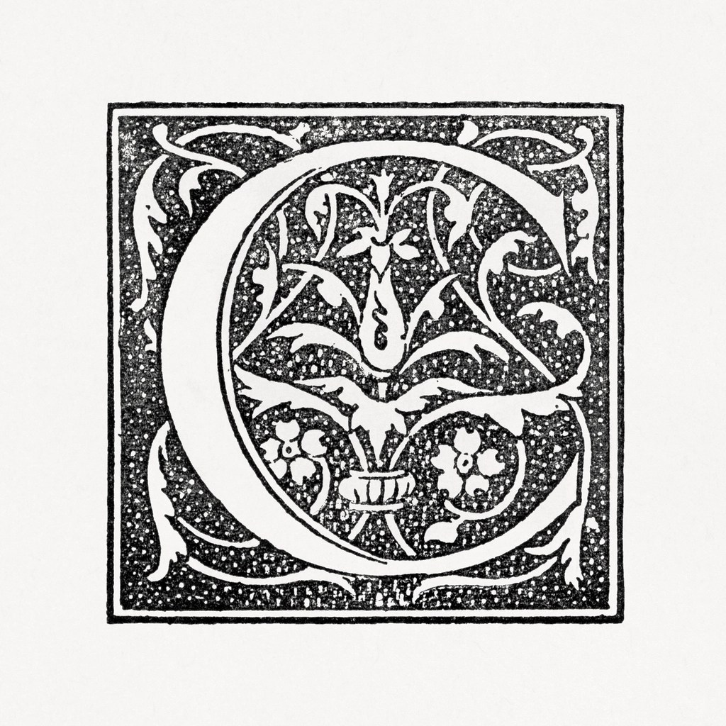 A black block print on a blue background of an illustrated capital letter "C".